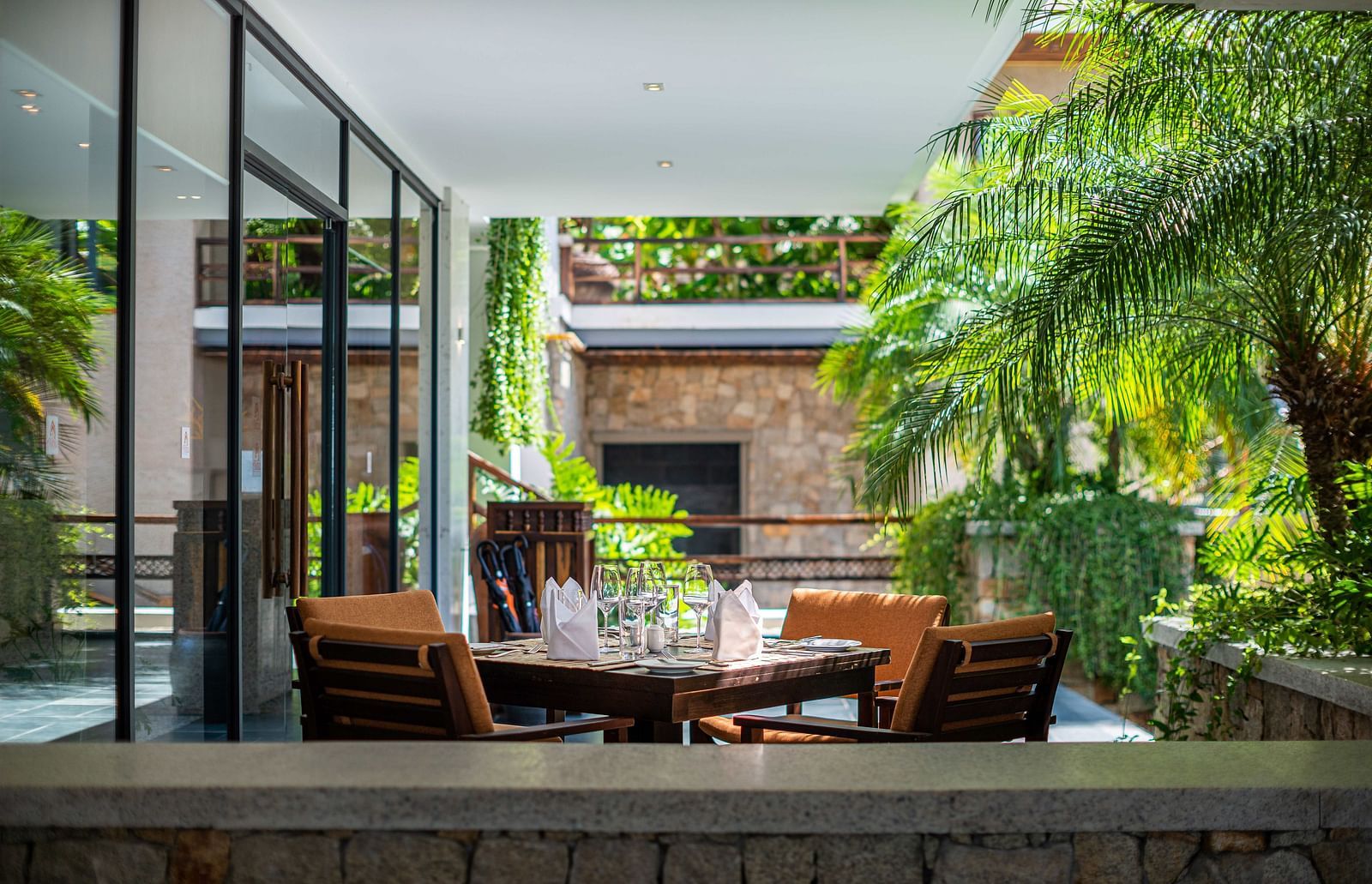 An outdoor seating arrangement for dining at our restaurant - Alibu Resort Nha Trang