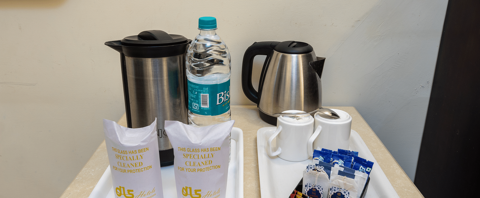The image shows a hotel room's tea and coffee setup | DLS The Pearl