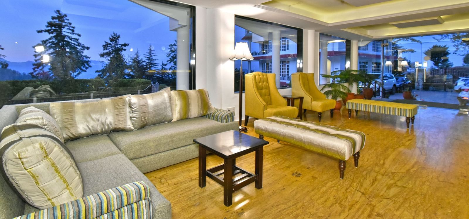 Lobby area with sofas at DLS Hillcrest Resort, Shimla.