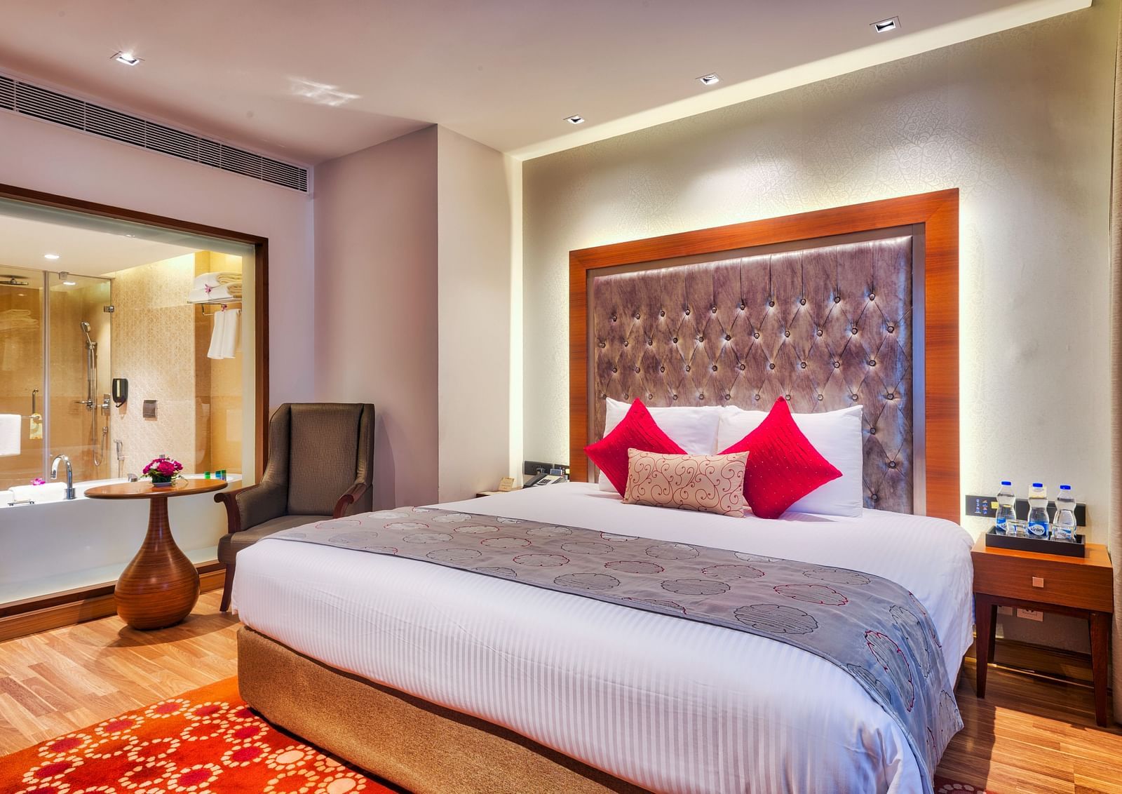 Deluxe Suite with a king size bed at Grand Chennai By GRT Hotels.