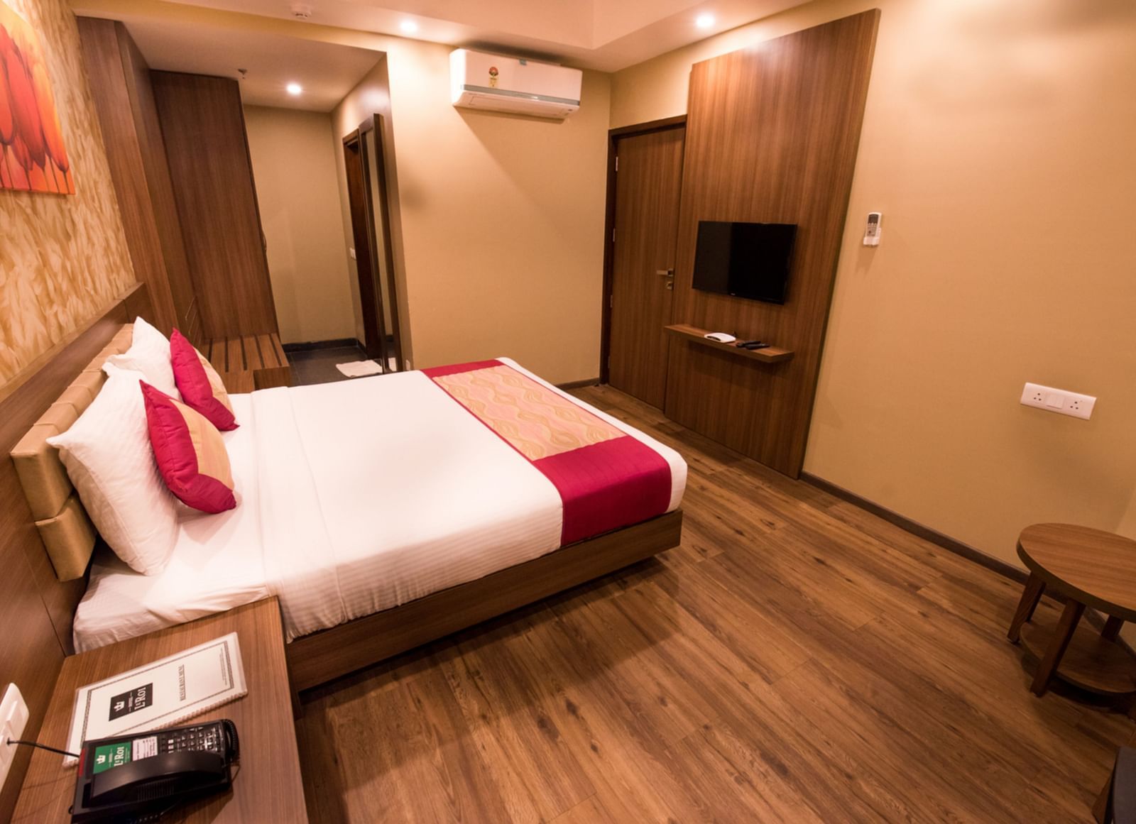 Suites Room with Complimentary Wi-Fi in a hotel room with separate living room that features a couch and a separate bedroom with a queen size bed - Le ROI Digha Hotel West Bengal6
