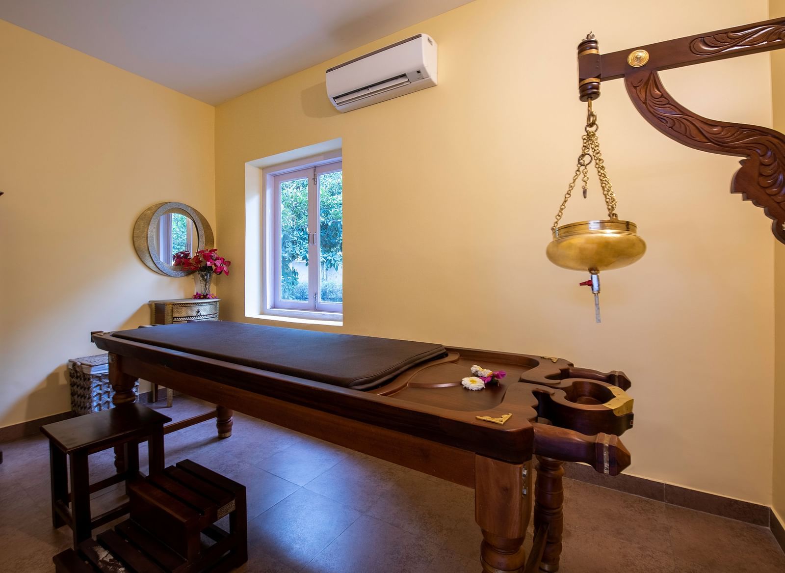 An image of a room with ayurvedic treatment in a spa at BluSalzz Resort.