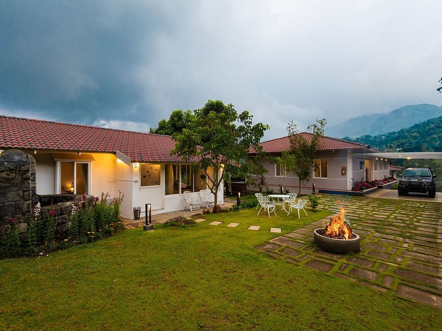 Annexe and Main House Exterior with out seating and campfire - Ibex Stays & Trails, Kotagiri
