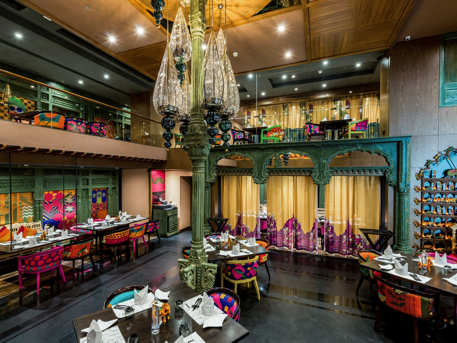 Seating arrangement of the restaurant at Grand Chennai By GRT Hotels.