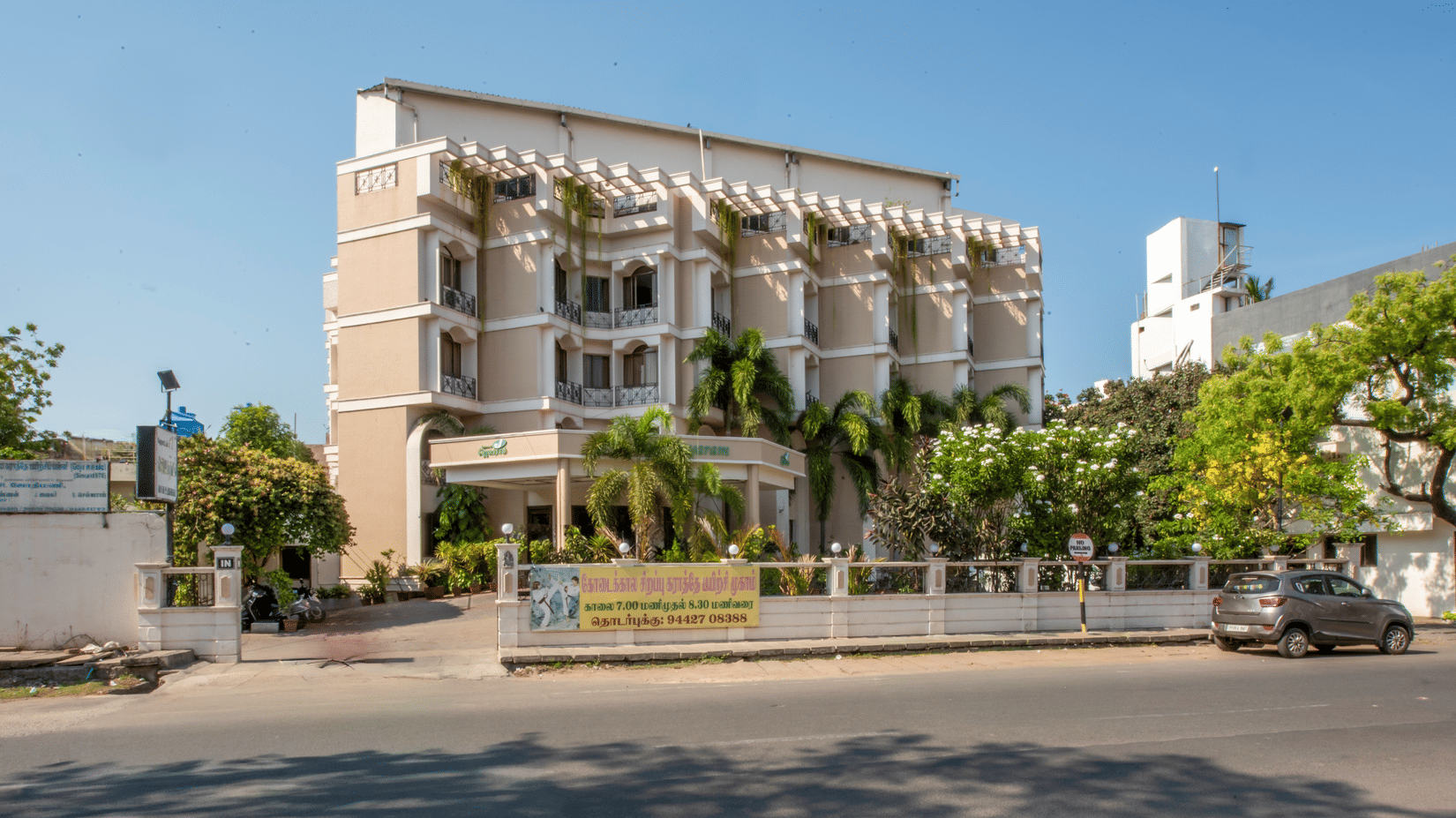 Exterior view of Jayaram Hotel, Pondicherry featuring the hotel building, entrance and surrounding streetscape.