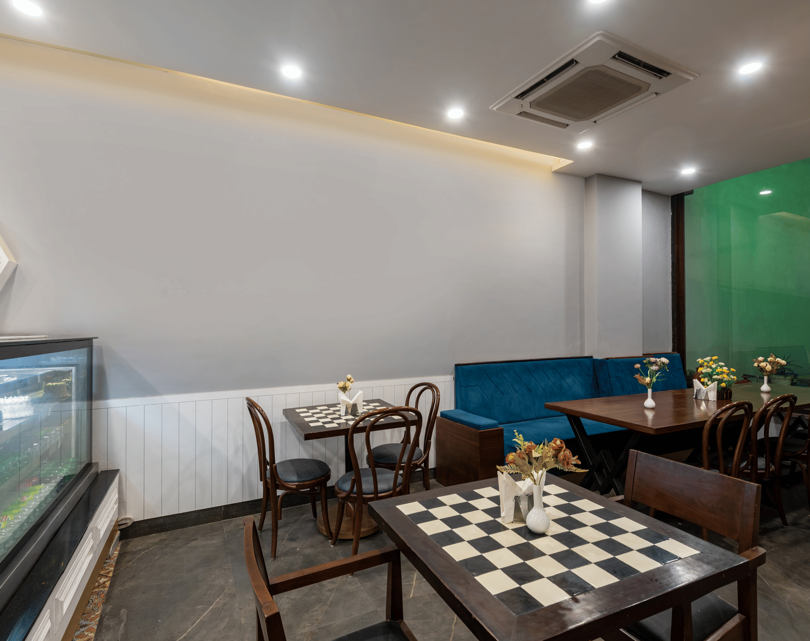 Side view of the cafe with air-conditioner attached to the ceiling at DLS The Classio, Rishikesh