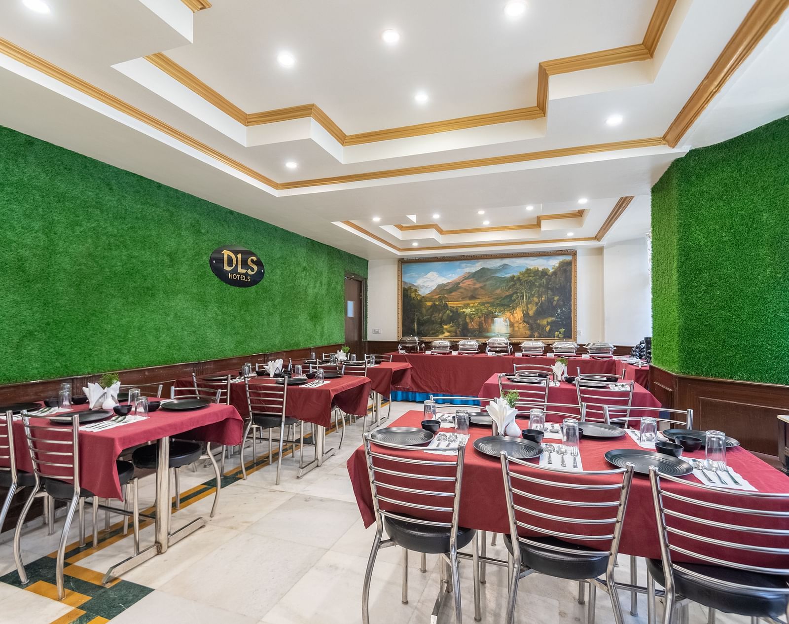Shot of the restaurant with dining tables and chair | DLS The Pearl