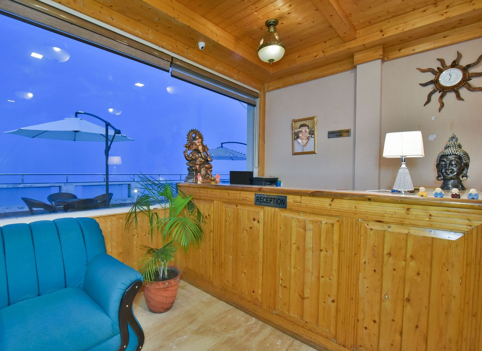Reception desk near the sofa in the lobby at DLS Highland Resort and Spa, Mussoorie.