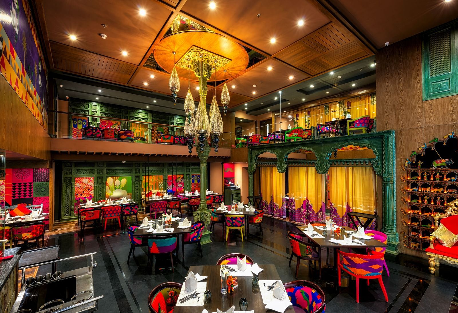 Seating arrangement of the restaurant at Grand Chennai By GRT Hotels.