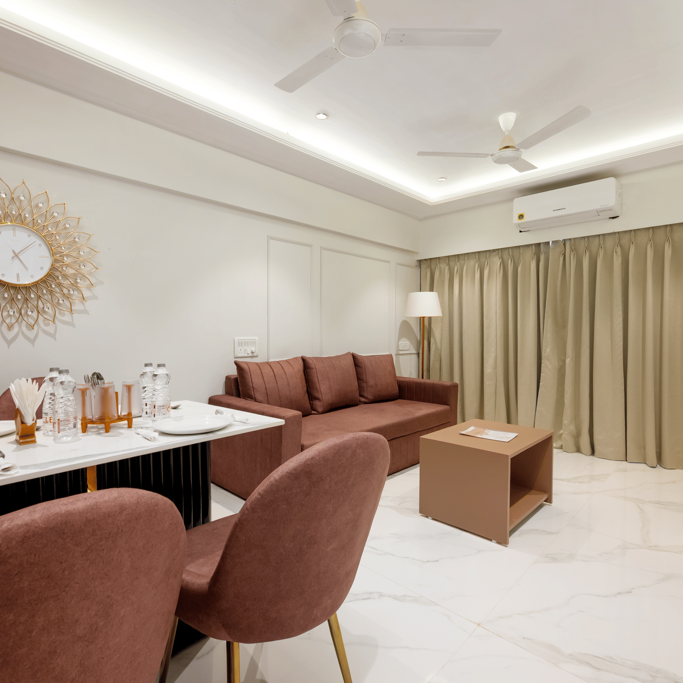 Open plan living and dining area in a serviced apartment at Home2 Residency, Mumbai Airport