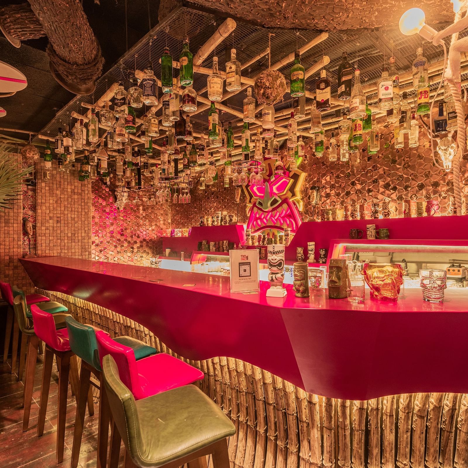 Tiki Tako at Hotel Park Elanza, Coimbatore featuring bar counter and chairs