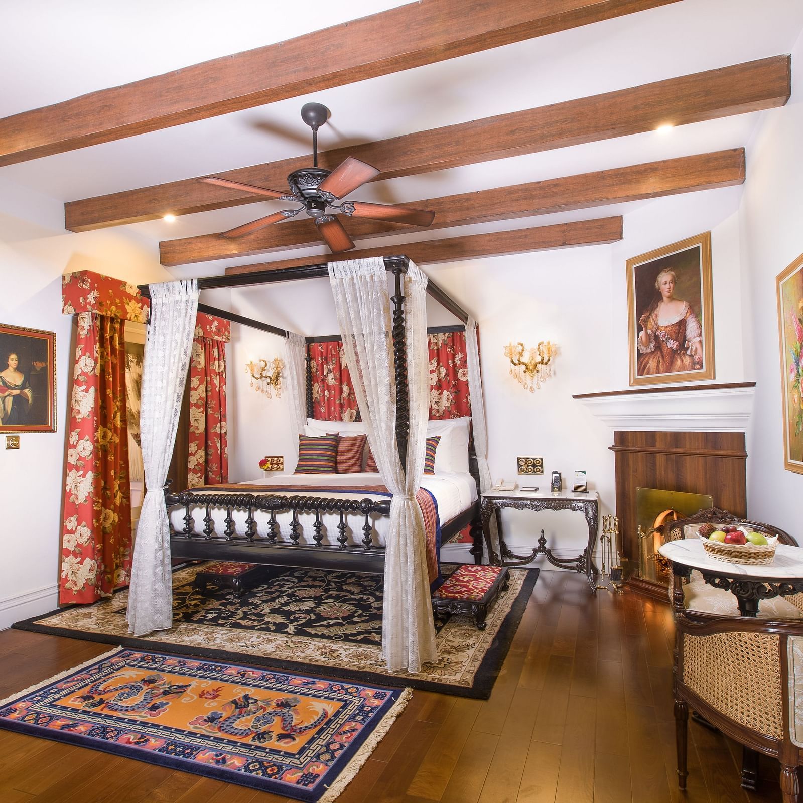 a regal-like bed and a carpet kept below it - Mayfair Himalayan Spa Resort Kalimpong
