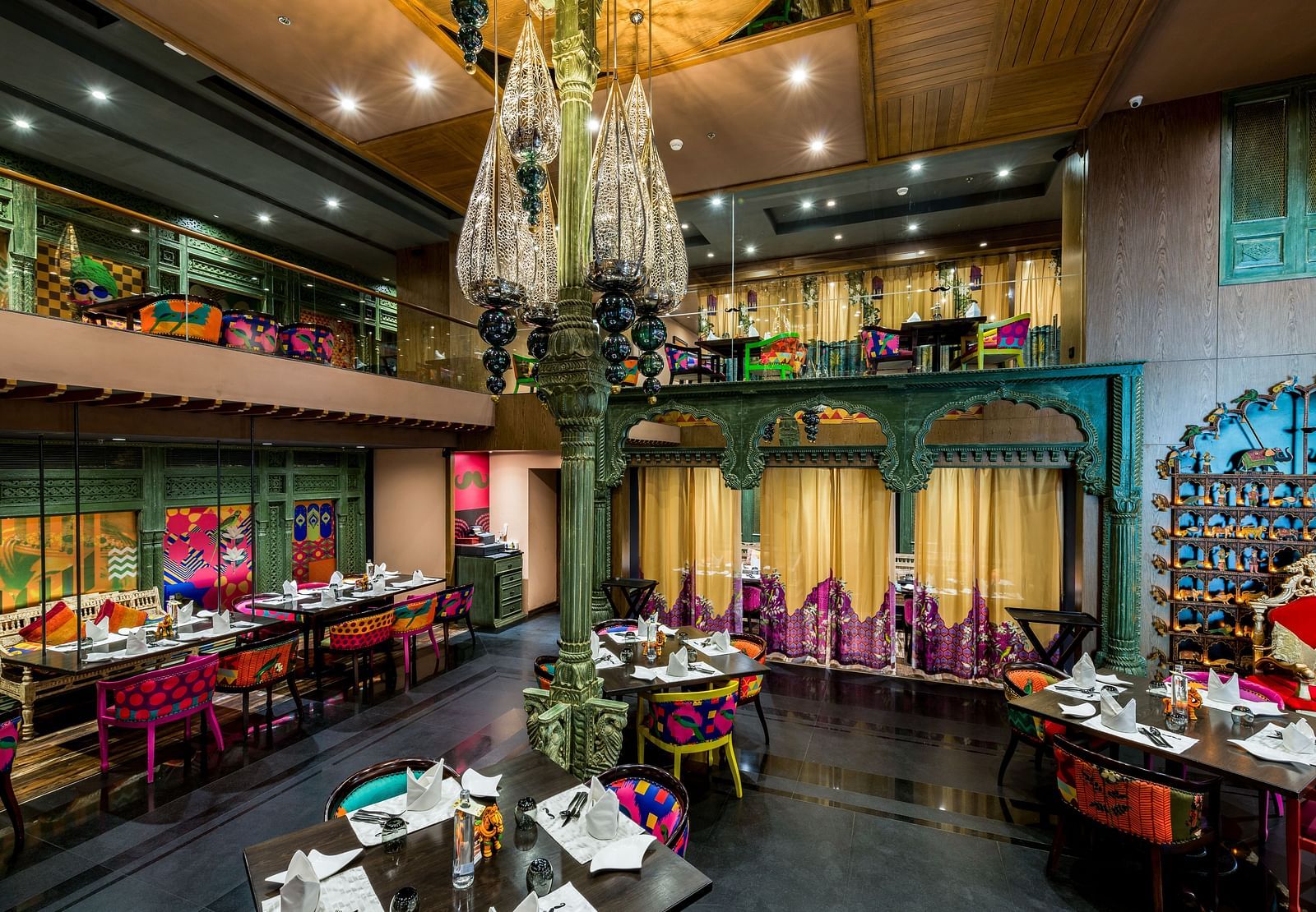 Seating arrangement of the restaurant at Grand Chennai By GRT Hotels.