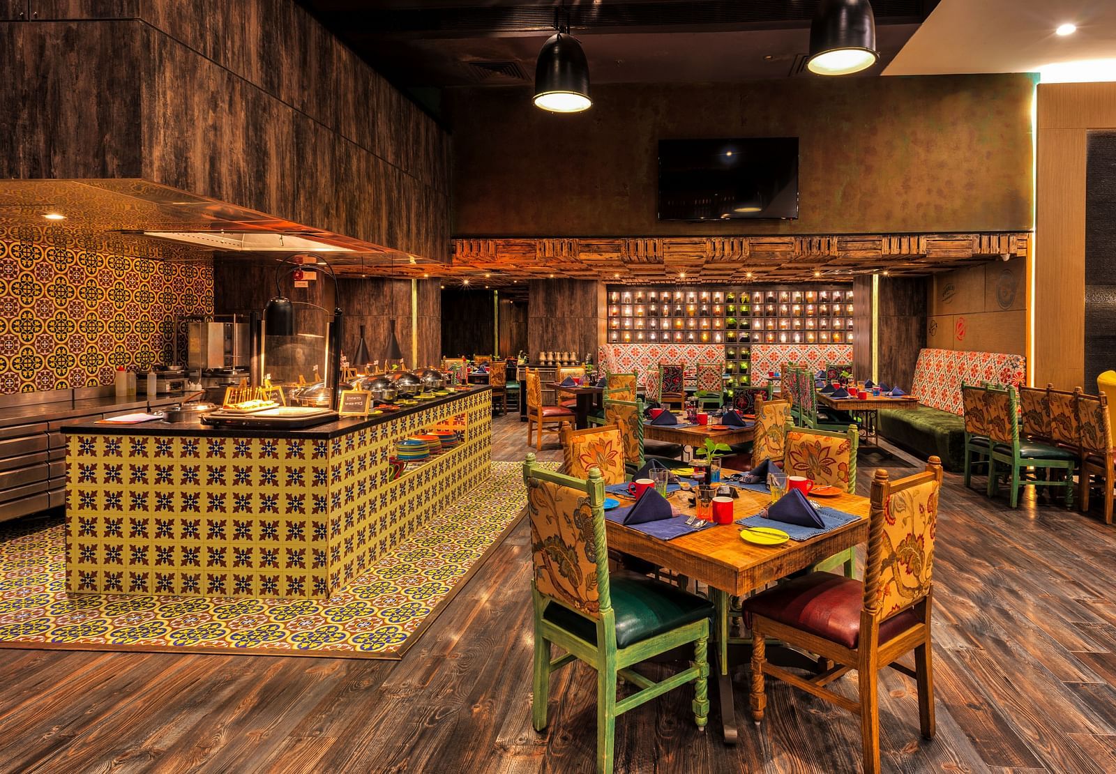 Seating arrangement of the restaurant at Grand Chennai By GRT Hotels.