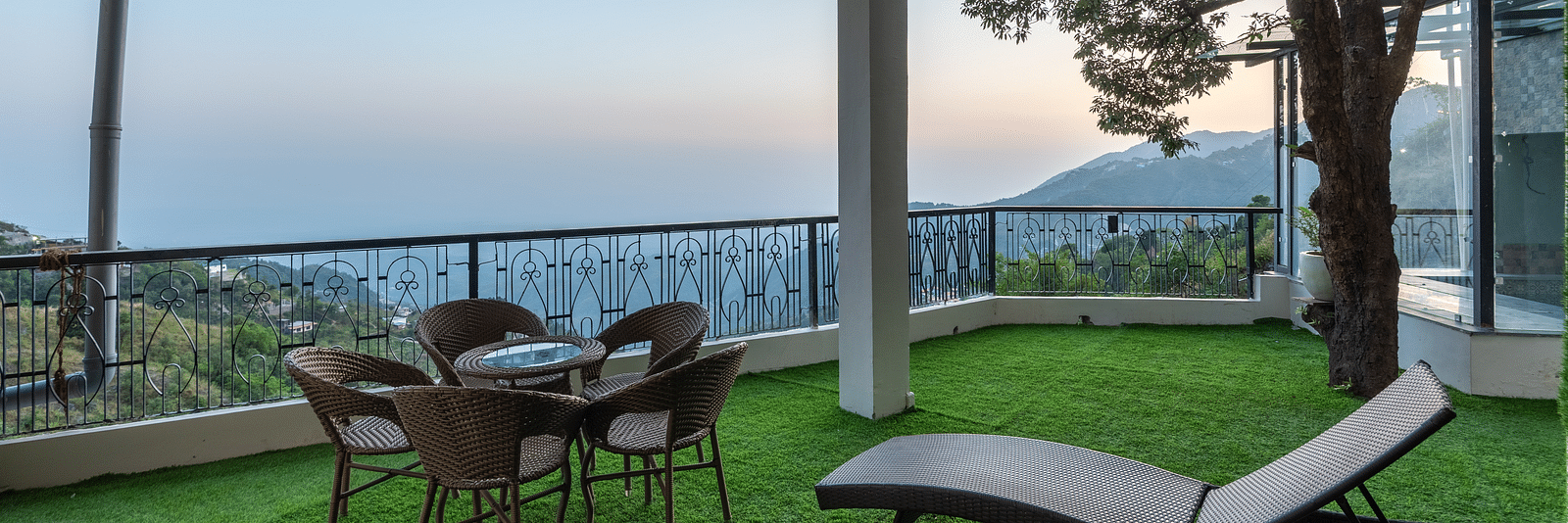 Seating area near the pool at DLS Highland Resort and Spa, Mussoorie.
