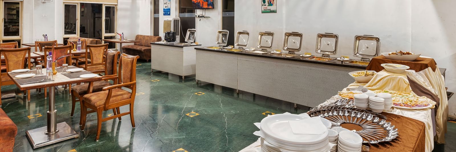 Buffet counter at The Darbar Restaurant with a simple and elegant interiors.