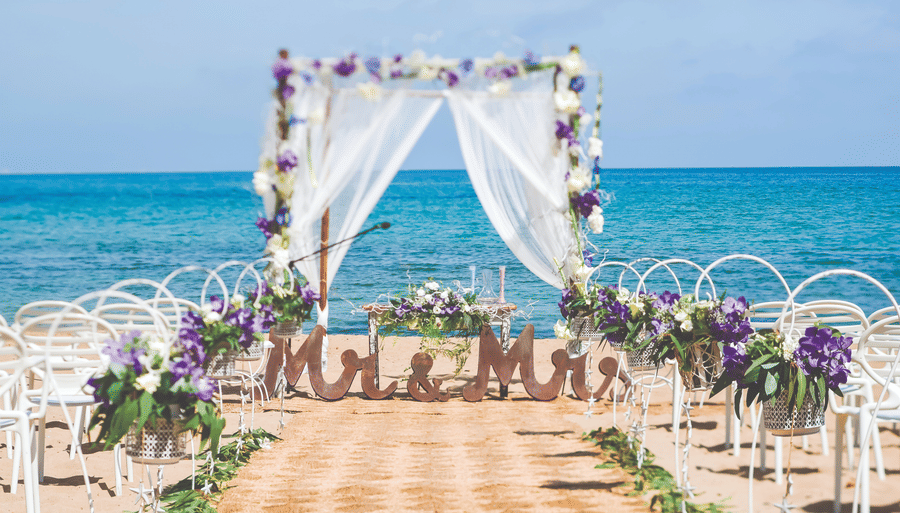 a wedding stage decorated with sheet cloth on the beach - Caravela Beach Resort Goa
