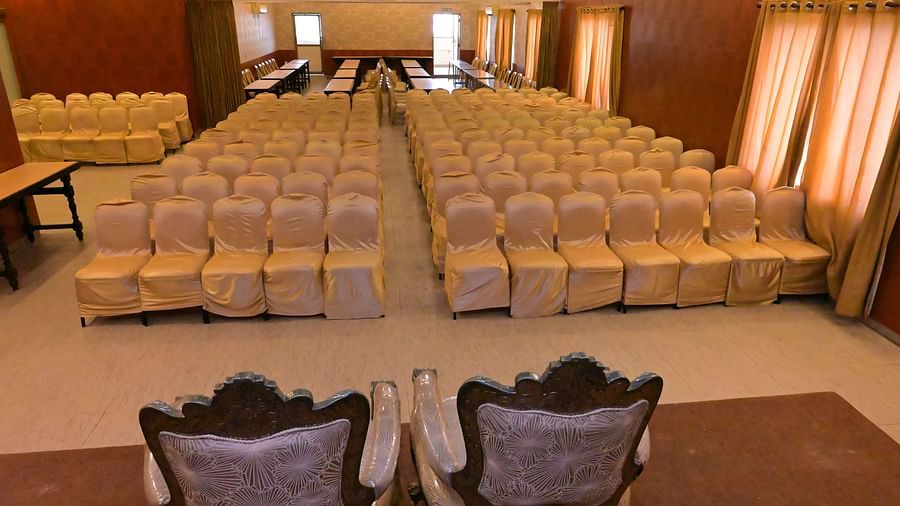 View of banquet hall with multiple chairs arranged for meetings and celebrations - Jayaram Hotel, Pondicherry