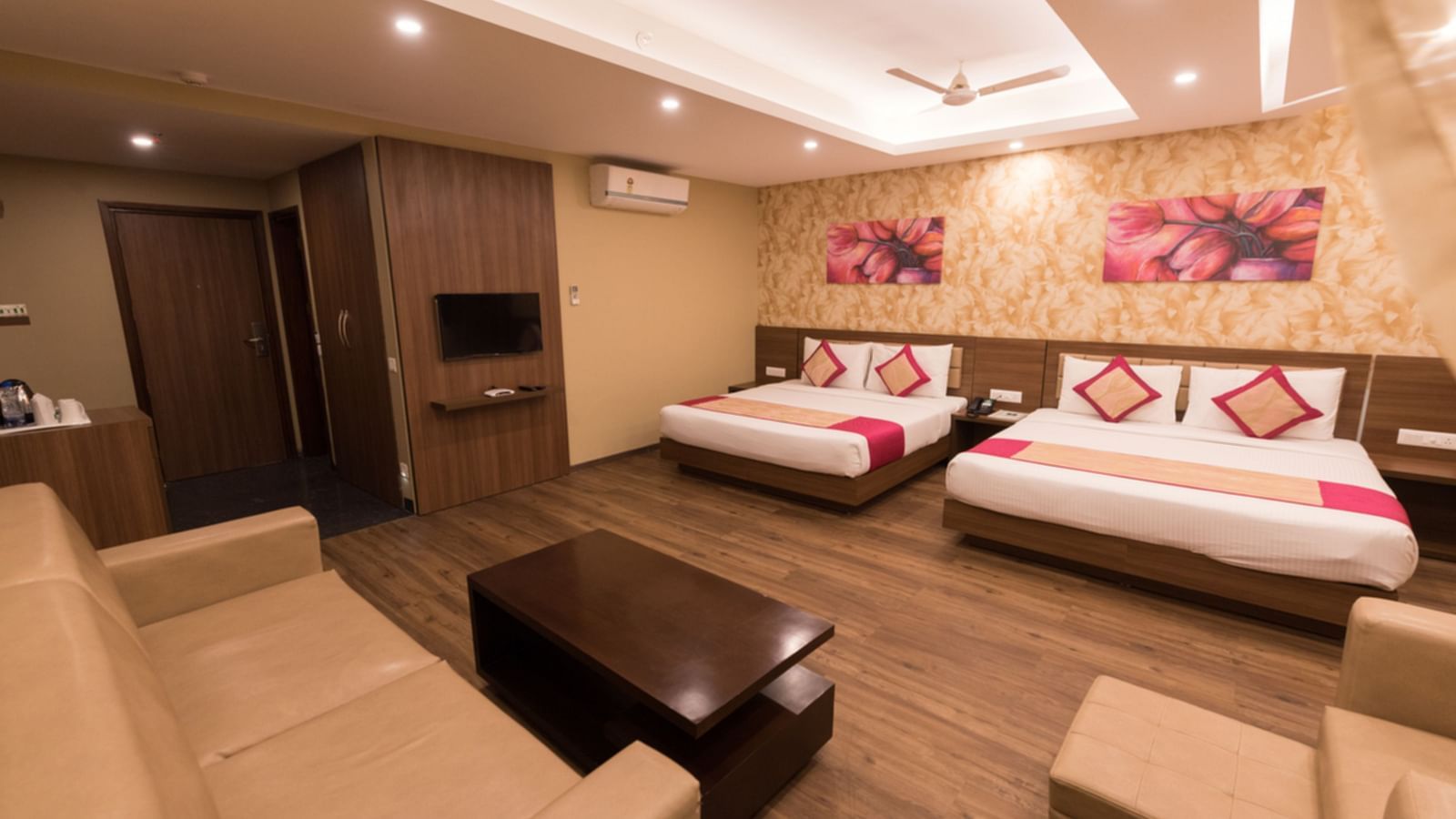 Family Rooms with Complimentary Wi-Fi showcasing queen size twin beds in a room along with various room amenities - Le ROI Digha Hotel West Bengal3