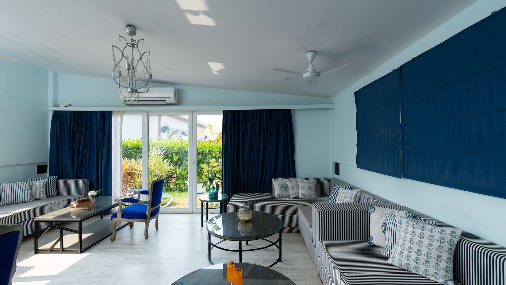 Living room with sofas and teapoys