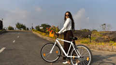 person walking with bicycle