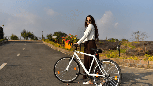 person walking with bicycle