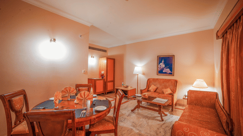 overview of the living area inside a suite room at Raj Park Hotel in Chennai