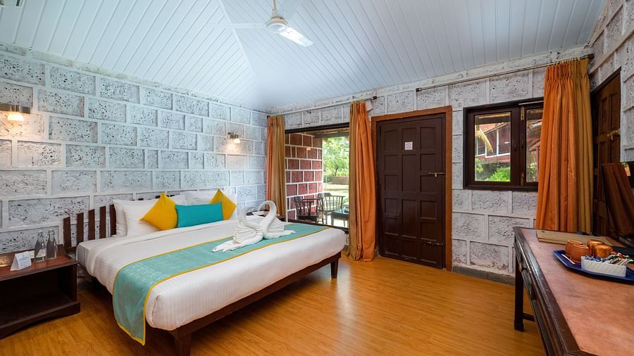Lotus eco beach resort, king size bed in Konkan Cottage in murud, Dapoli