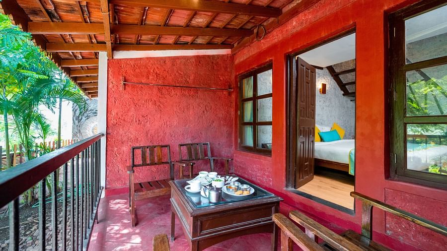 Lotus eco beach resort, coffee table in balcony at Kutumbh Suites near murud beach