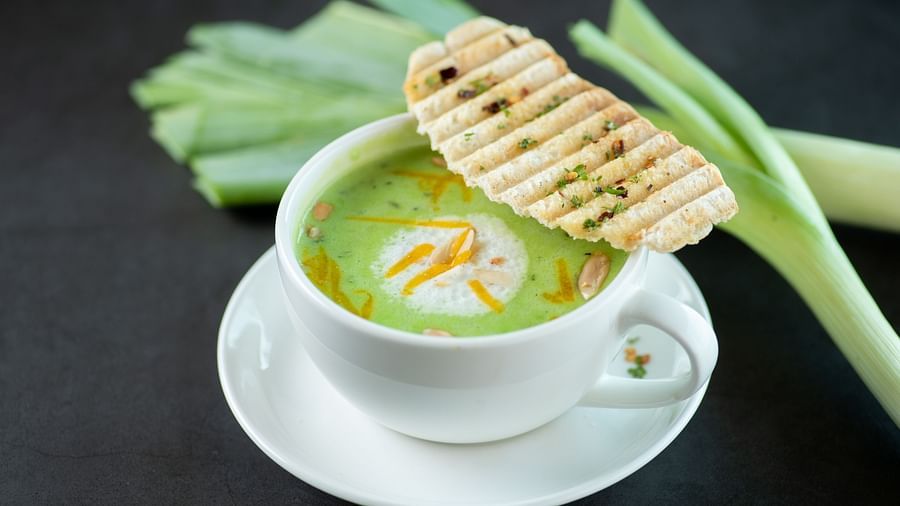 a bowl of green soup - polo floatel kolkata