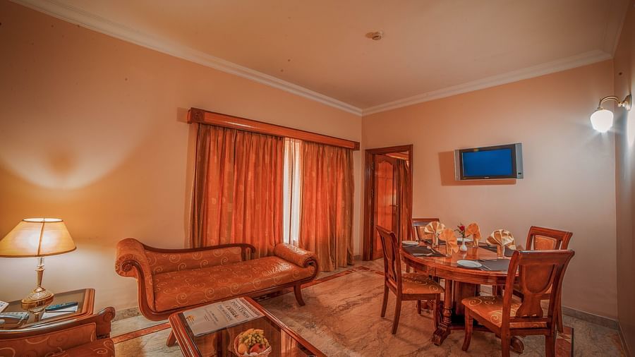 overview of the living area inside a suite room at Raj Park Hotel in Chennai