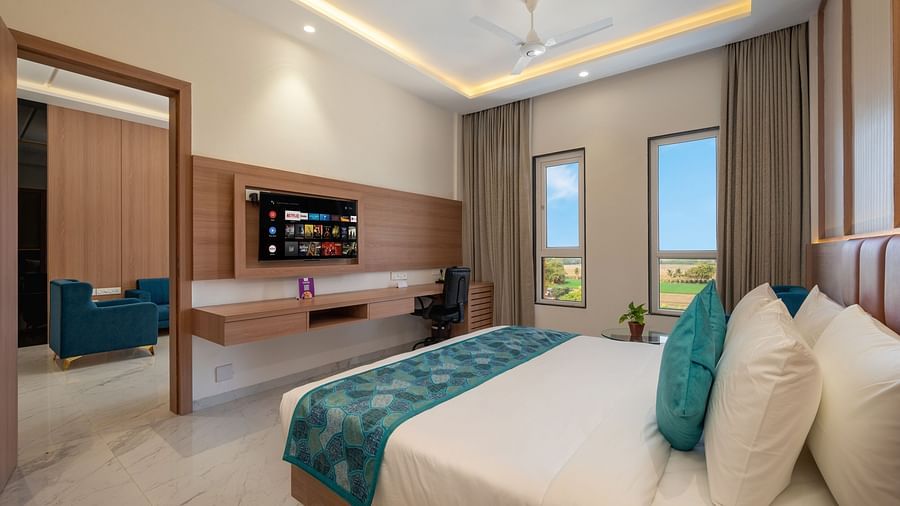 The orchid suite having a King Size bed - The Orchid Hotel, Jamnagar