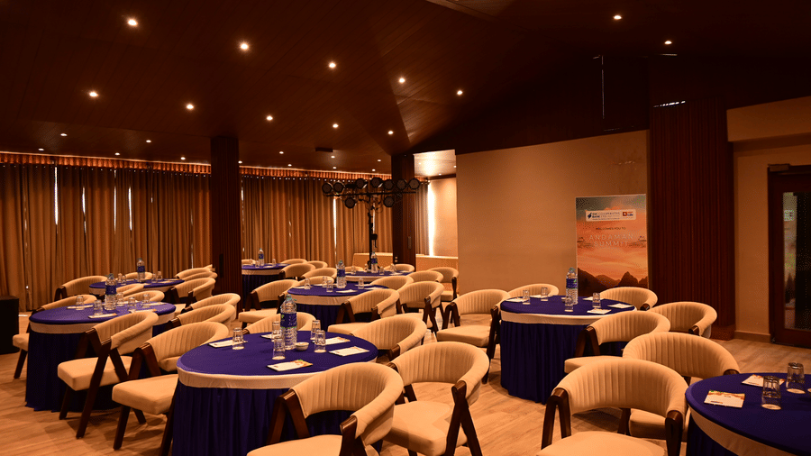 Elegant banquet hall with round tables and warm lighting setup at Silver Sand Beach Resort, Havelock