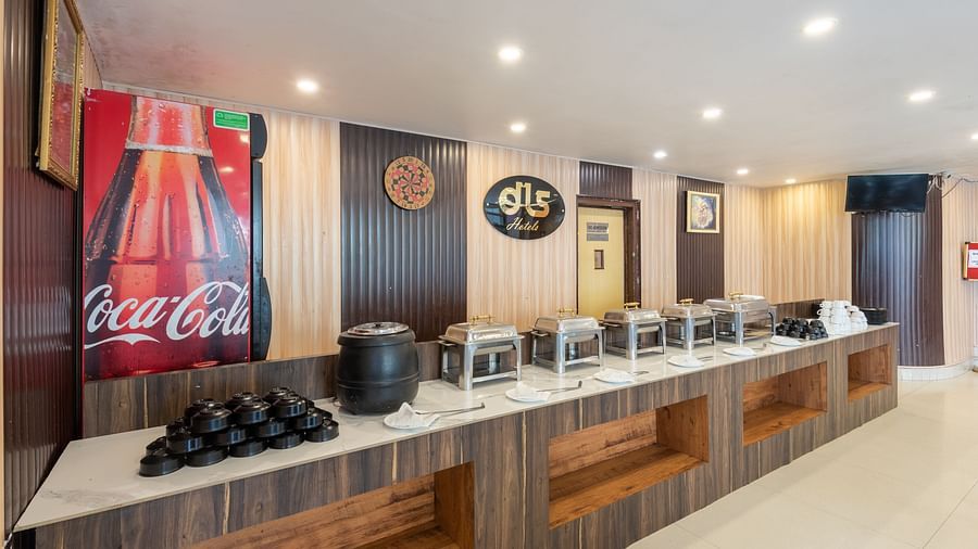 Image of a buffet organised in one section of the restaurant | DLS Anupam Resort, Dharamshala