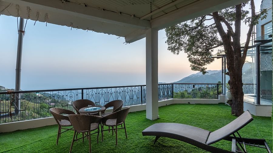 Seating area near the pool at DLS Highland Resort and Spa, Mussoorie.