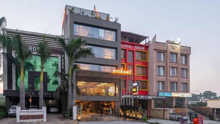 Facade image of DLS Hotel Arihant, Haridwar with a clear sky in the background