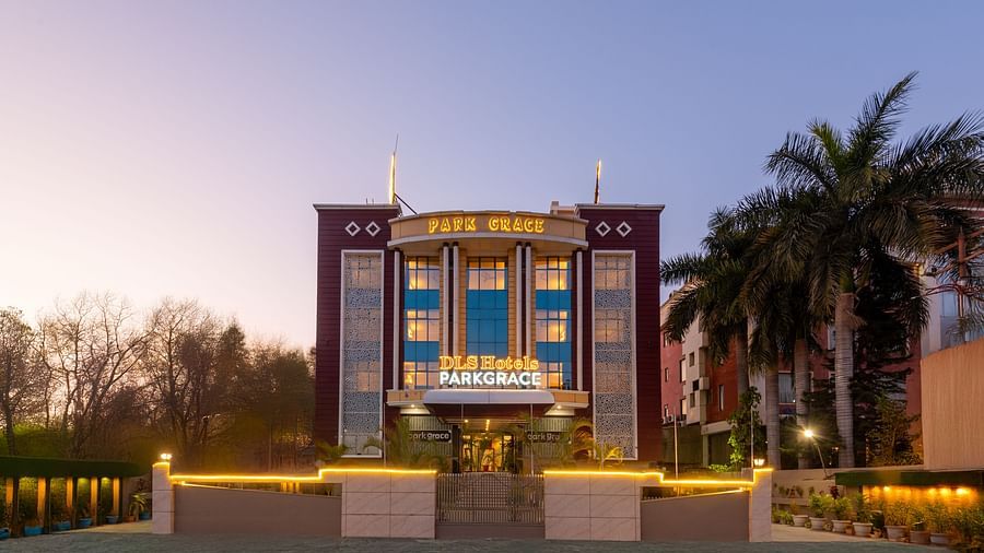 Facade of DLS Park Grace hotel in Haridwar decorated with lights.
