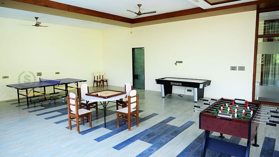 Pool table, fossball table and a chessboard in the Indoor Games at The Silver Sky Hotels and Resorts, Chikkamangaluru