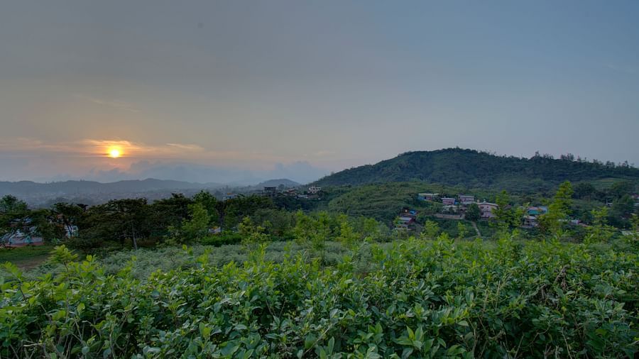 Green Valleys and hills with a sunset | Woodstock Resorts, Coorg