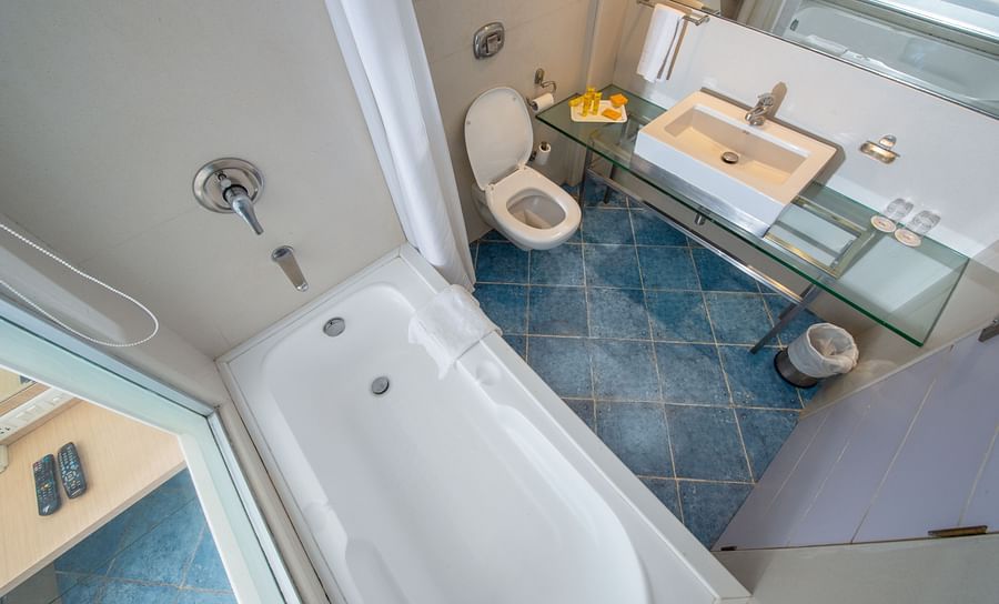 thematic rooms with attached bathroom and bathtub at hotel bawa suites