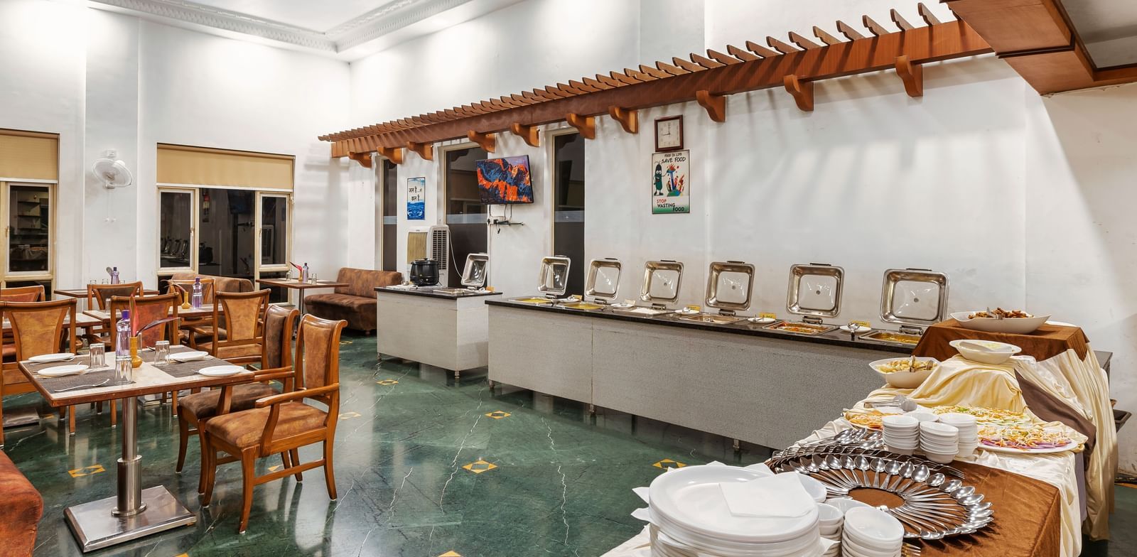 Buffet counter at The Darbar Restaurant with a simple and elegant interiors.