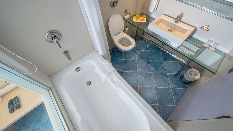 thematic rooms with attached bathroom and bathtub at hotel bawa suites
