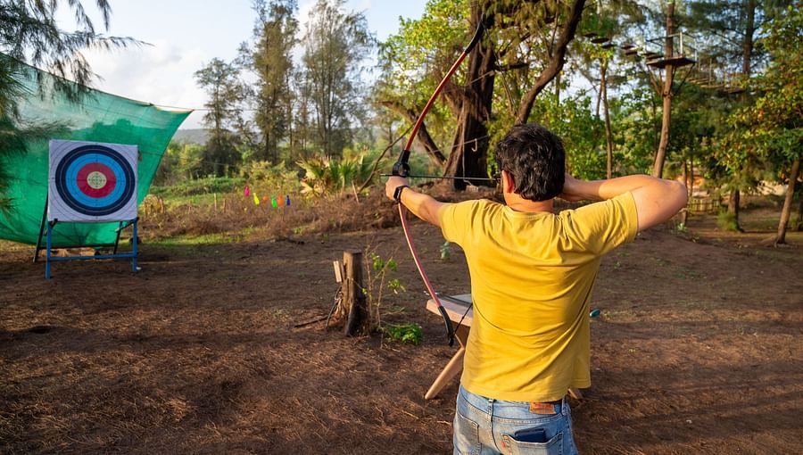Lotus Eco beach resort, a person drawing a bow