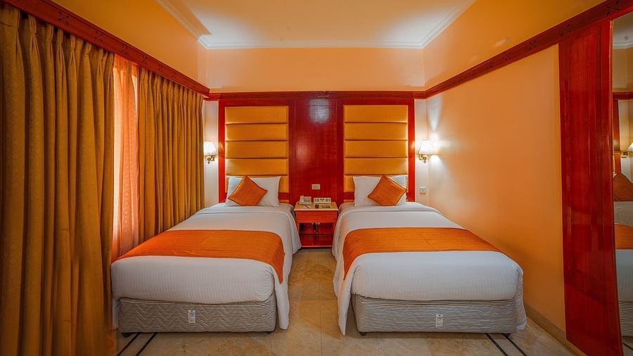 twin beds inside a bedroom at Superior Room at hotel Raj Park, Chennai