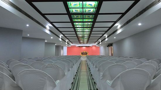 Theatre style seating arrangements inside the a banquet hall at Jayaram Hotel, Pondicherry