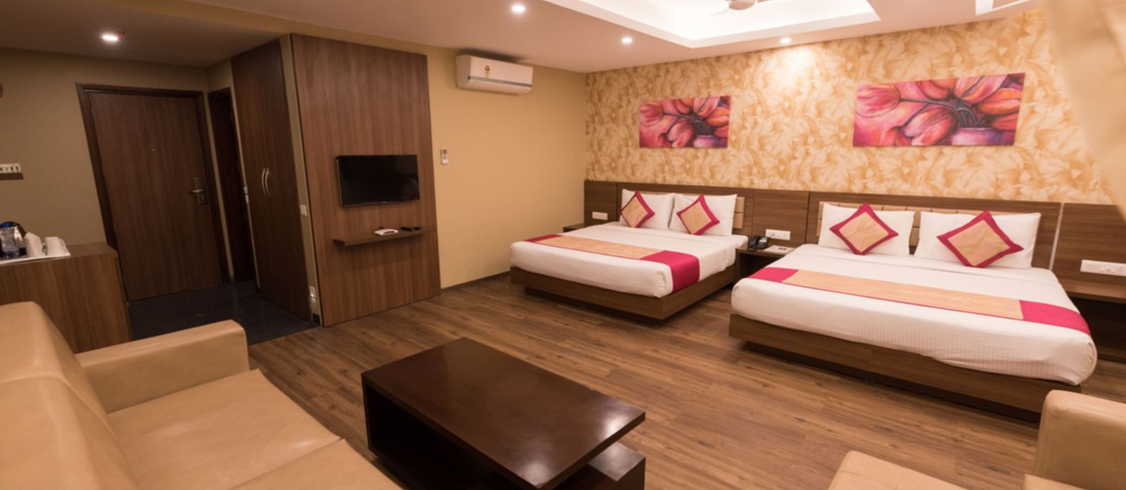 Family Rooms with Complimentary Wi-Fi showcasing queen size twin beds in a room along with various room amenities - Le ROI Digha Hotel West Bengal3