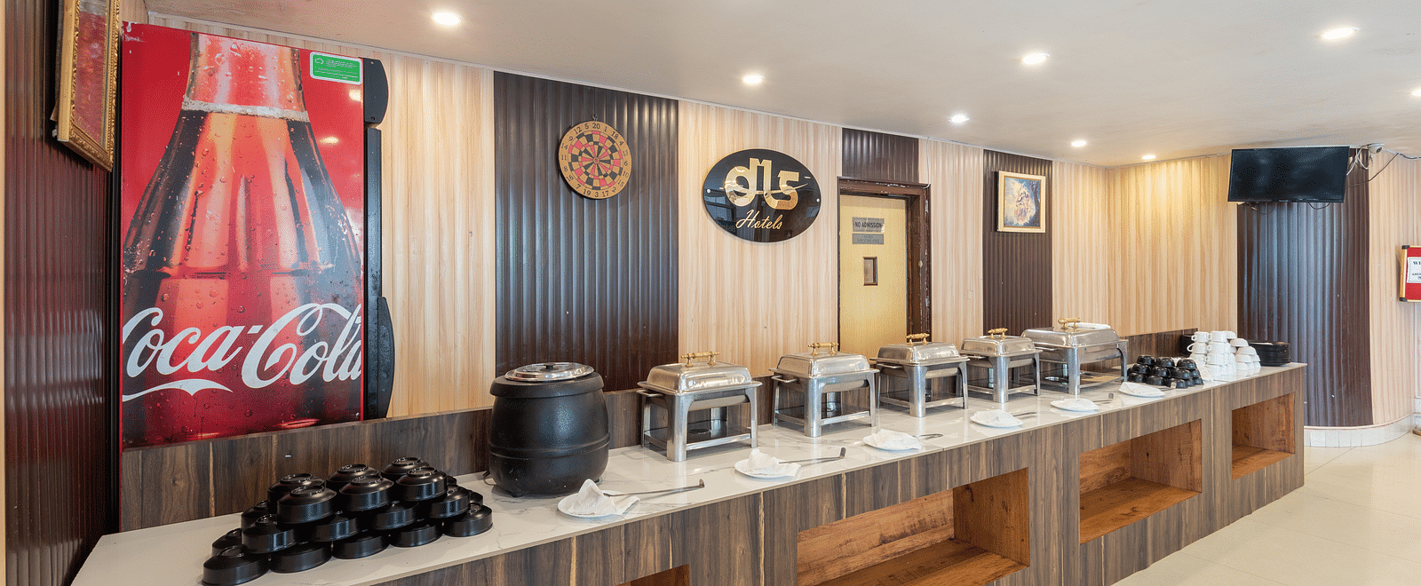Image of a buffet organised in one section of the restaurant | DLS Anupam Resort, Dharamshala