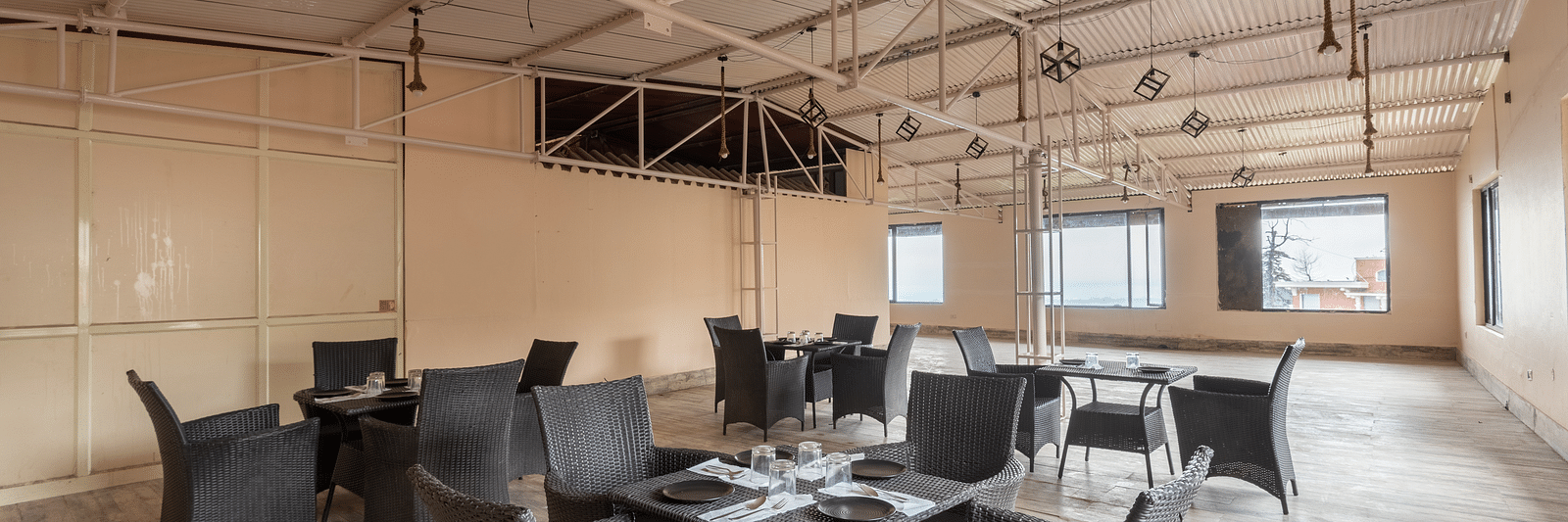 Image of tables and chairs arranged inside the large hall | DLS The Pearl
