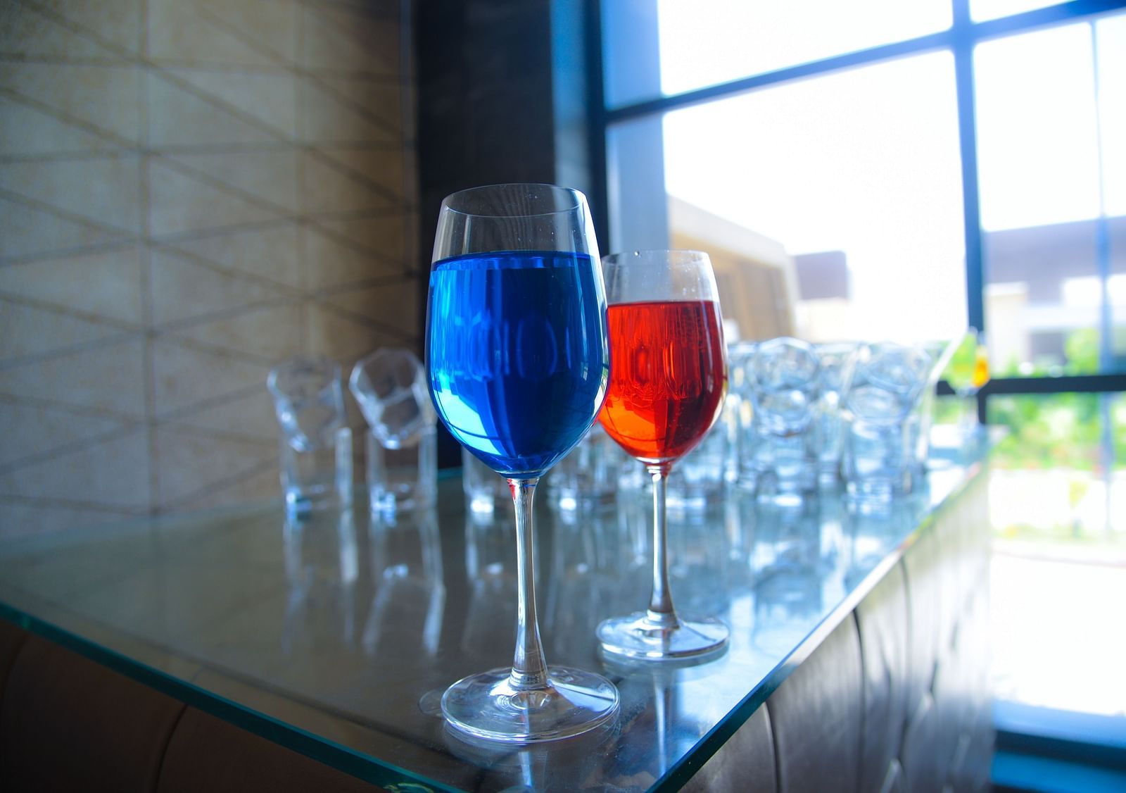 Wine glasses on a serving counter - Golden Blossom Imperial Resorts, Lucknow