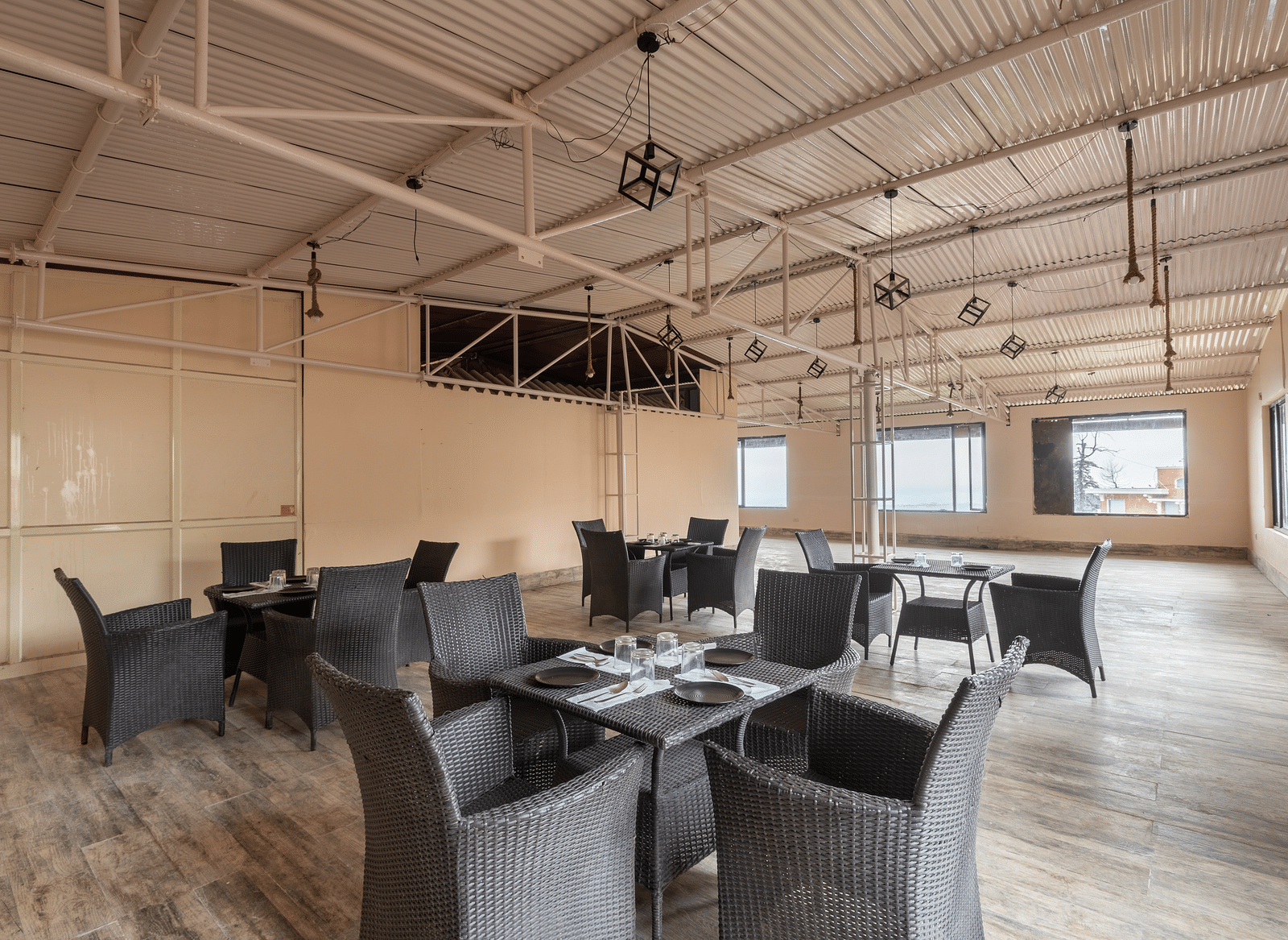 Image of tables and chairs arranged inside the large hall | DLS The Pearl